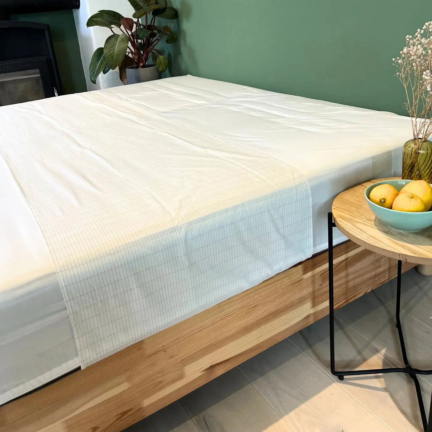 Draps de grounding mise en valeur dans une chambre à coucher avec ambiance cosy